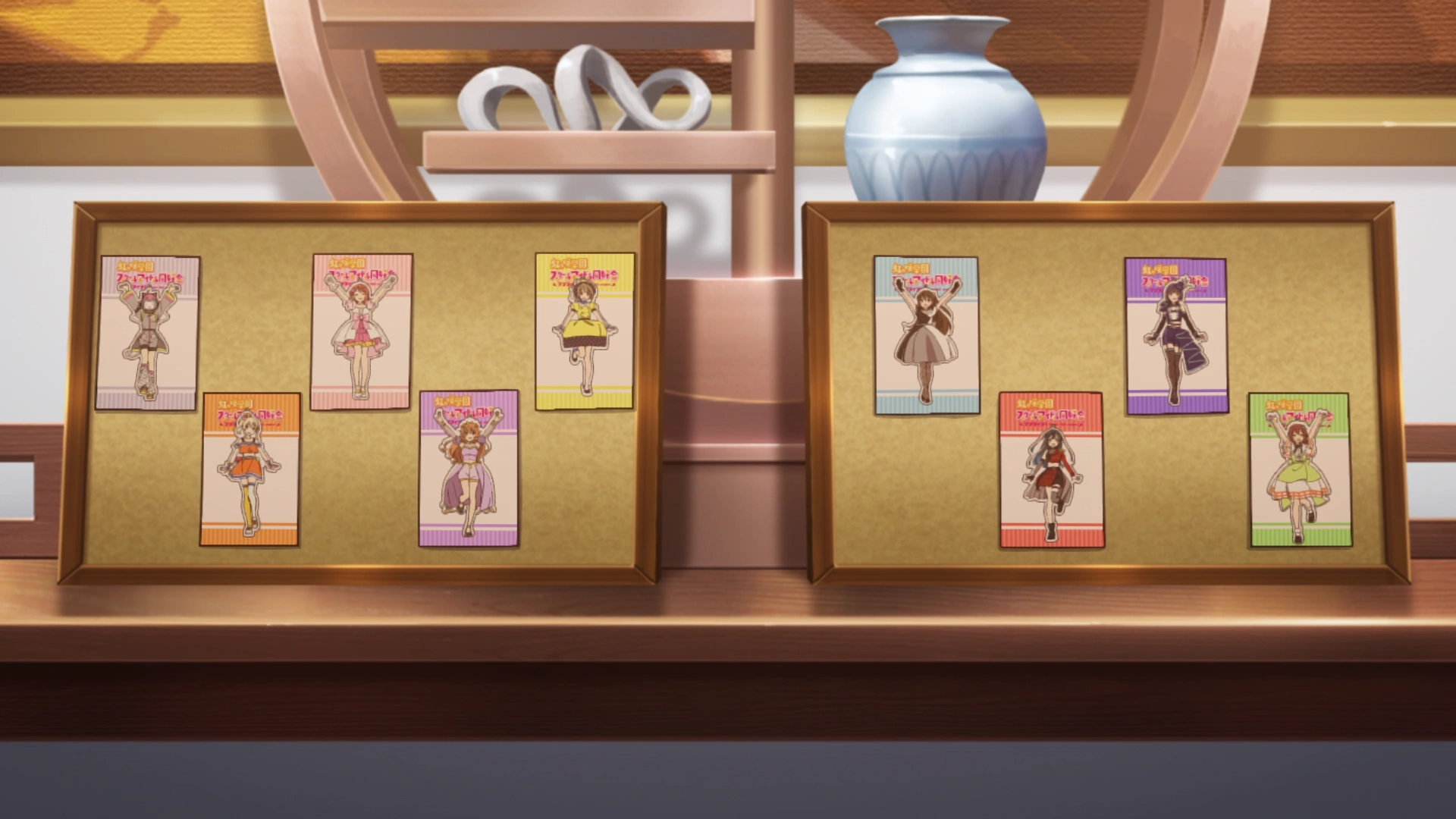 Lanzhu Zhong's Nijigasaki School Idol Club merch being displayed in her apartment.